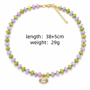 Colorful glass bead necklace with gold eye pendant, length 38+5cm and weight 29g.