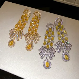 Vintage palace style 18k gold plated earrings with shimmering yellow water drop zircons