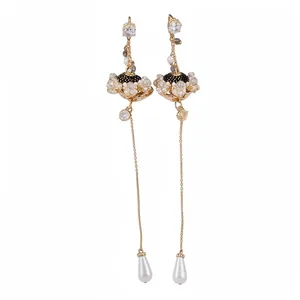 Elegante vintage etnische bloemoorbellen met zirkonia en witte pareldruppelhangers
