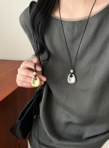 Minimalist Korean style matte oval pendant necklace for women in gold and silver finish
