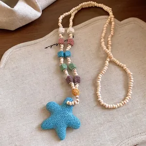 Collar estrella de mar de piedra volcánica de colores con cuentas de madera para la playa