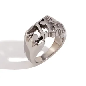 Minimalist titanium steel FLY cutout letter ring in polished silver-tone finish.