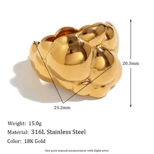 Detailed view of minimalist chunky 18K gold plated stainless steel ring with specs