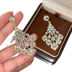 Elegant vintage French style gold chandelier earrings with shimmering waterdrop crystals