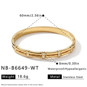 Gold-plated stainless steel bracelet with cubic zirconia detailing and size specifications