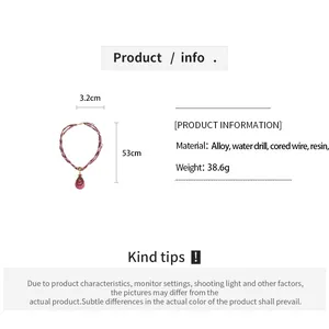 Details van afmetingen en materiaalspecificaties voor vintage druppelvormige hanger ketting.