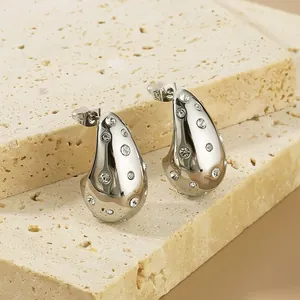 Polished silver stainless steel teardrop stud earrings with sparkling rhinestones