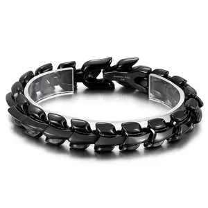 Bold black dragon bone stainless steel link bracelet for men with a polished punk style finish