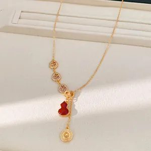 18K gold-plated necklace with hollow Fu characters and a red enamel gourd pendant