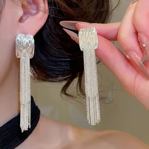 Silver pleated metal earrings with long elegant double-layer tassels