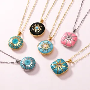 Detailed view of colorful stainless steel enamel locket necklaces with sun motifs
