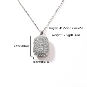 Macro detail of zircon pavé locket necklace showing dimensions and weight info