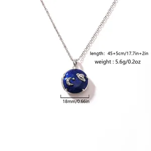Detailed view of blue glitter moon star planet locket necklace with measurement annotations