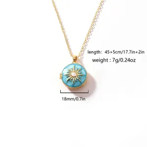 Close-up of blue sunburst enamel locket necklace with 18mm diameter and 45cm length