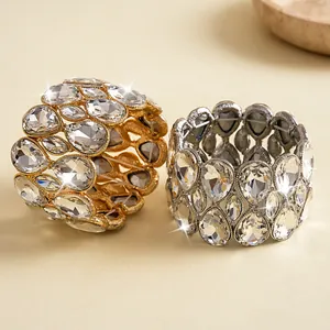 Macro view of luxury teardrop crystal stretch bracelets in gold and silver finish