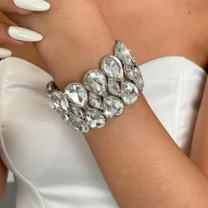 Detailed view of elegant silver double-row teardrop crystal elastic bracelet on wrist