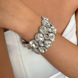 Detailed view of a stunning double-layer teardrop crystal stretch bracelet on model wrist