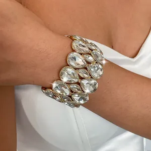 Detailed close-up of a luxurious elastic bracelet with sparkling pear-shaped crystals