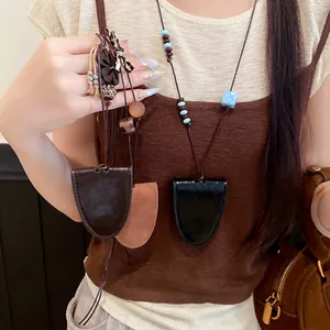 Long leather necklace key holder pendant for stylish accessories and eyewear hooks