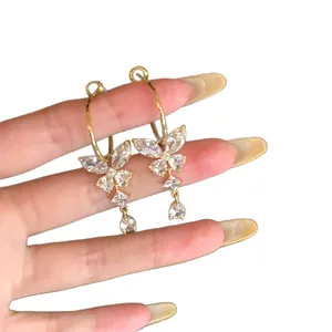 Elegante gouden vlinder oorbellen met fonkelende zirkonia kristallen voor dames
