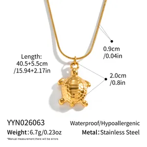 Detail of gold-plated stainless steel turtle necklace with dimensions and material specs