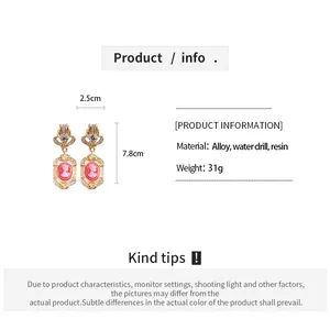 Vintage palatial style cameo earrings with pink resin and rhinestones, 7.8cm long