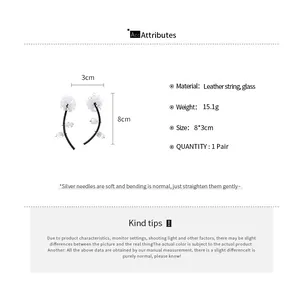 Détails du produit et guide des tailles pour boucles d'oreilles en cristal noir et blanc
