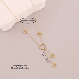 Detail view of gold heart lariat necklace showing measurements and material specifications