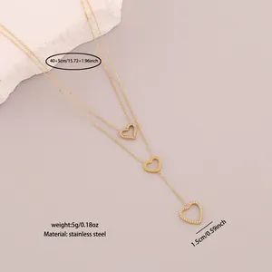 Detailed view of gold stainless steel triple heart tassel necklace showing weight and dimensions