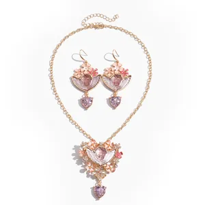 Vintage engel en hart sieradenset met roze bloemen en paarse kristalaccenten voor dames