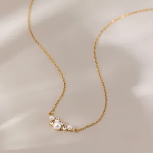 Elegant 18k gold plated stainless steel necklace with pearl and zircon smile pendant