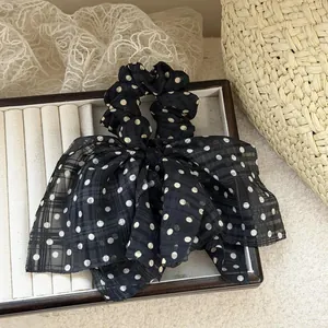 Elegant black and white polka dot chiffon bow scrunchie hair tie for stylish women's hairstyles