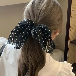 Elegant black chiffon hair tie with white polka dots and large bow design for women