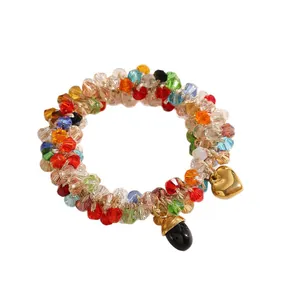 Colorful crystal beaded dual-use hair tie bracelet with a golden stainless steel heart charm