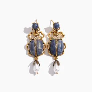 Boucles d'oreilles scarabée dorées vintage avec pierre bleue et perle