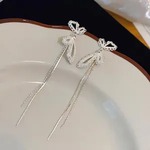 Elegant French style silver butterfly earrings with long tassel detail for women