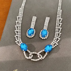 Elegante sieradenset met blauwe ovale stenen en kristallen strass ketting en oorbellen