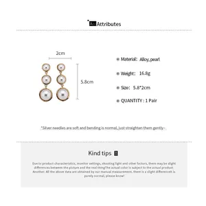 Spécifications du produit pour ces boucles d'oreilles vintage à triple perle