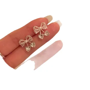 Boucles d'oreilles élégantes avec nœud de style coréen, zircons brillants et perles