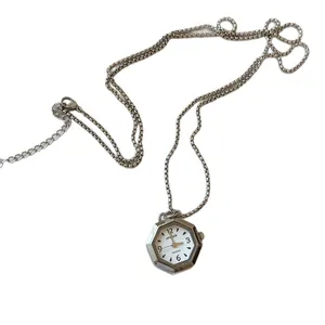 Minimalist hexagonal pendant watch necklace with silver box chain for women.