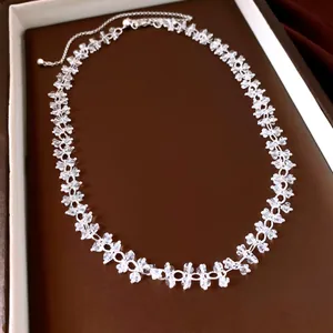 Detailed macro view of an elegant clear crystal beaded choker necklace for women