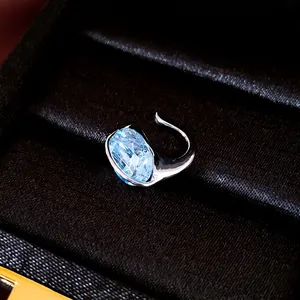Elegant silver-plated ear cuff featuring a sparkling light blue oval zircon stone detail