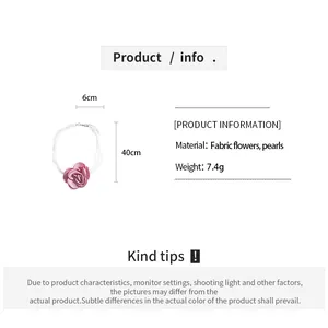 Detail view of pink fabric rose and pearl necklace with 40cm length and 7.4g weight