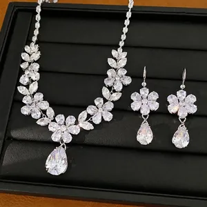 Elegant zircon flower and waterdrop jewelry set with necklace and earrings ensemble.