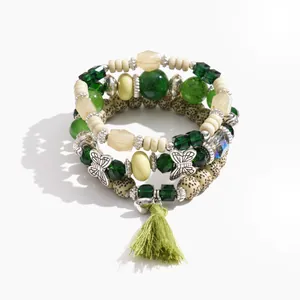 Set di 4 braccialetti vintage con perle verdi, nappa e farfalla