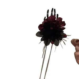 Gothic dark flower hair clip with skeleton hand and silver chain tassels