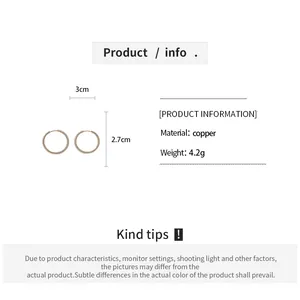 Detailed view of elegant copper hoop earrings showing dimensions, weight, and material.