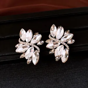 Elegant leaf-shaped crystal stud earrings with marquise-cut stones and silver needles.