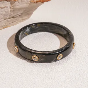 Modern Chinese style black marbled resin bangle adorned with luxury crystal rivet studs