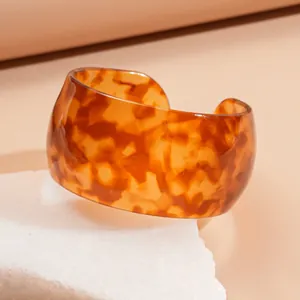 Fashionable tortoiseshell pattern wide open cuff bracelet made of premium amber resin finish